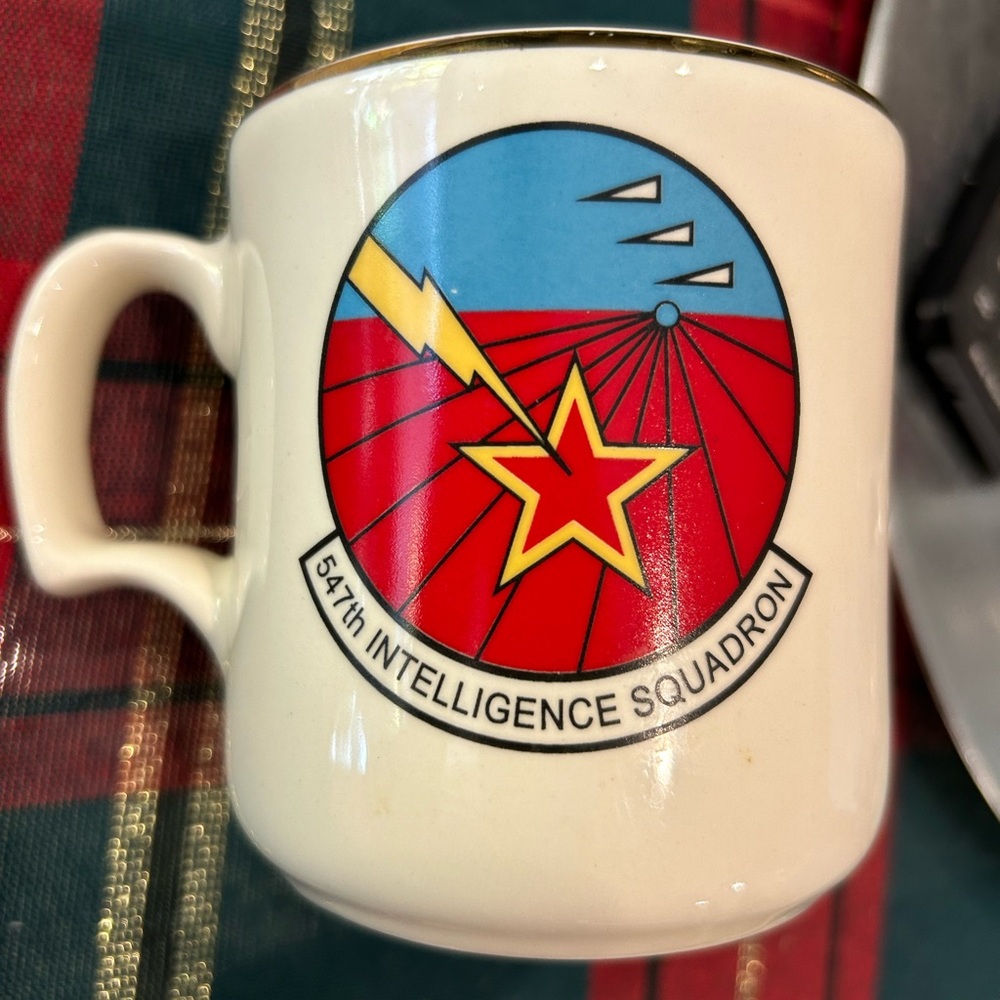White Ceramic Mug with Colorful Emblem